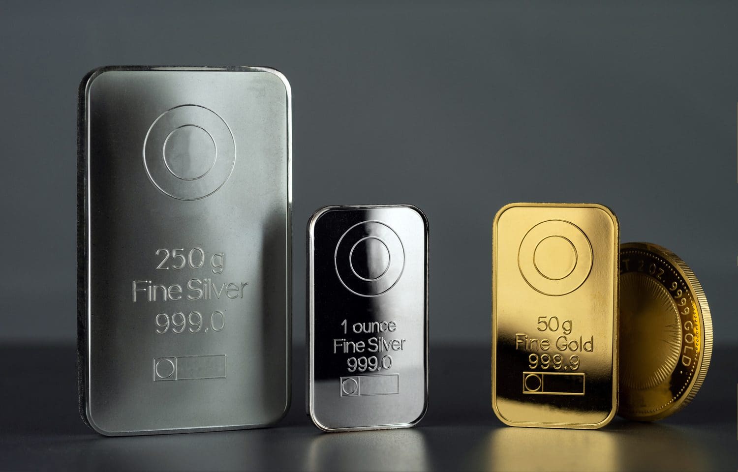 Gold and silver bars with coins