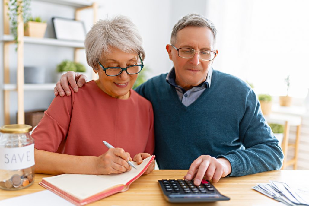 Elderly married couple open a senior bank account