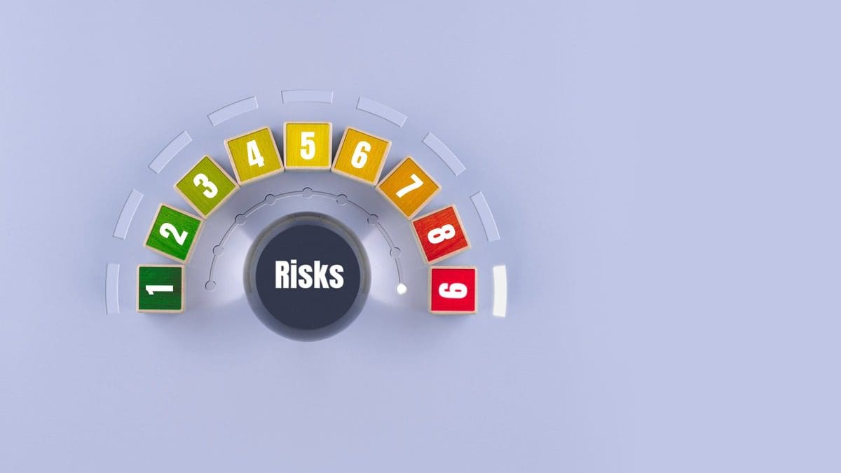 Conceptual illustration of an investment risk level gauge ranging from low to high risk.