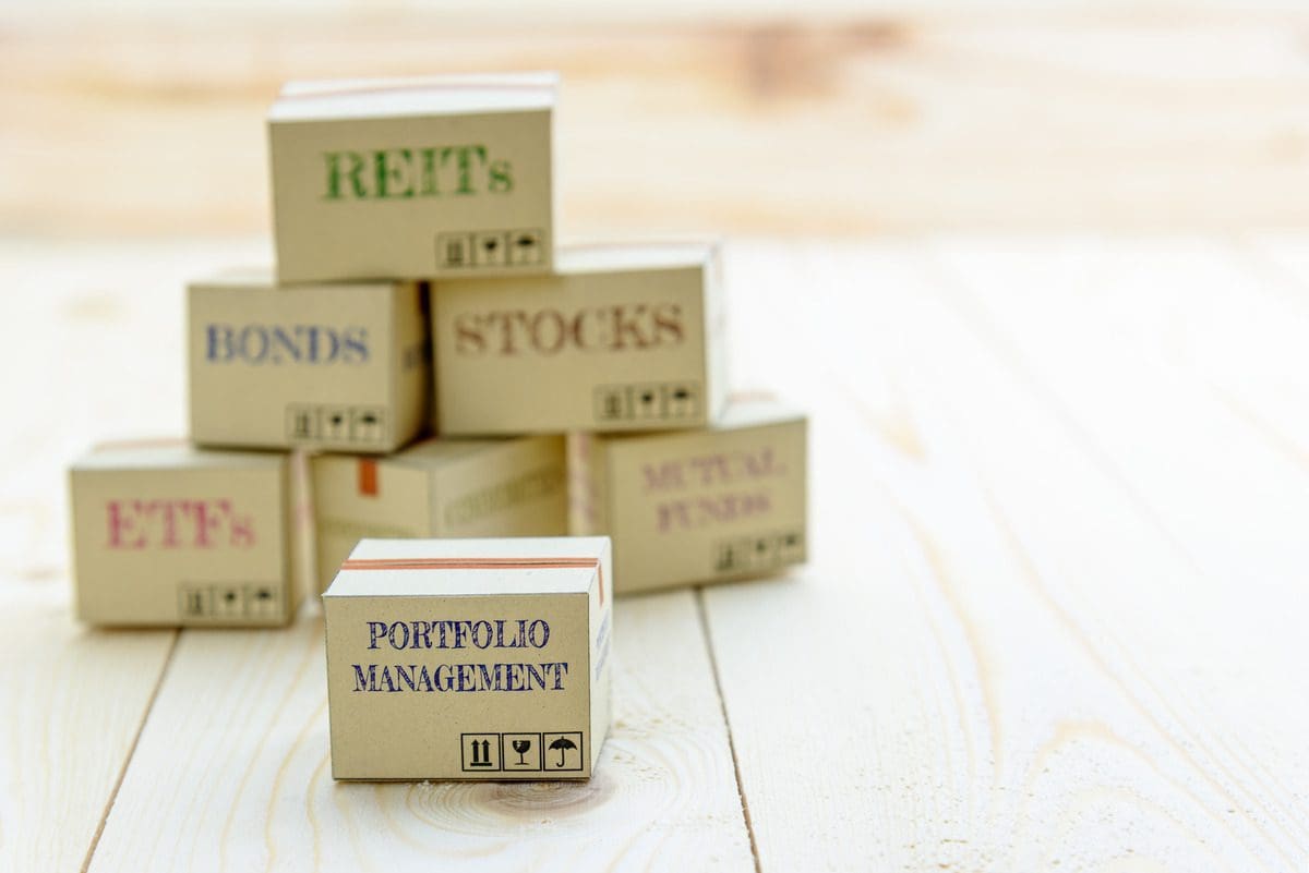 Stacked boxes labeled ETFs, stocks, bonds