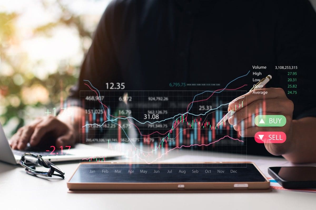 Investor using a tablet to conduct research on market trends and stock analysis