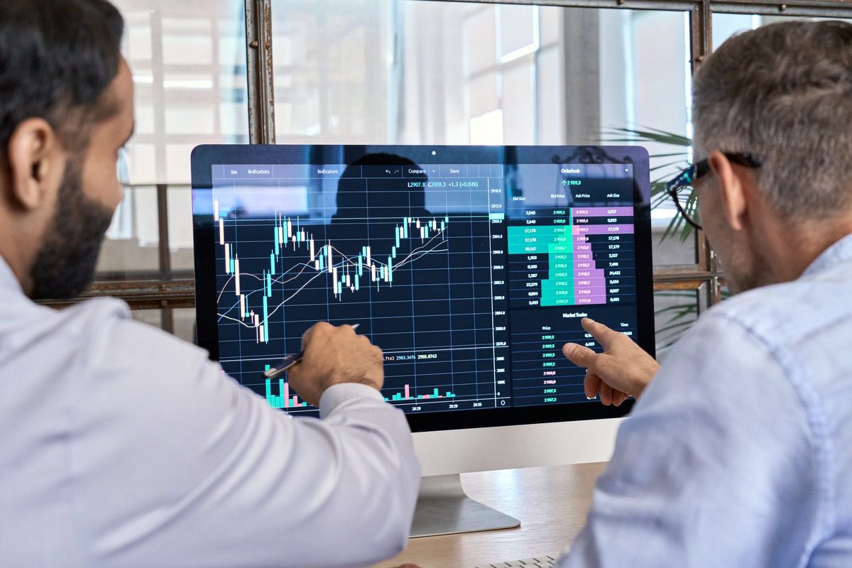 Financial analysts reviewing market trends