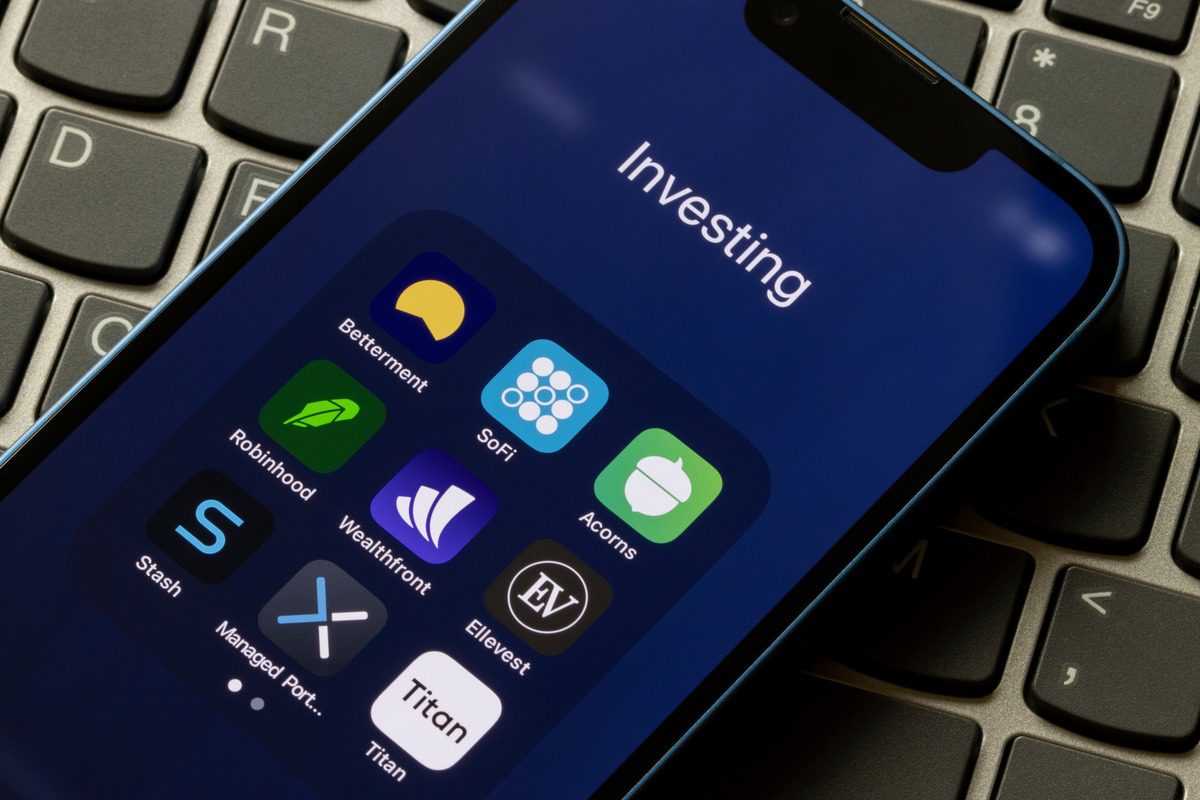 Smartphone screen displaying a collection of popular digital investing and financial management applications.