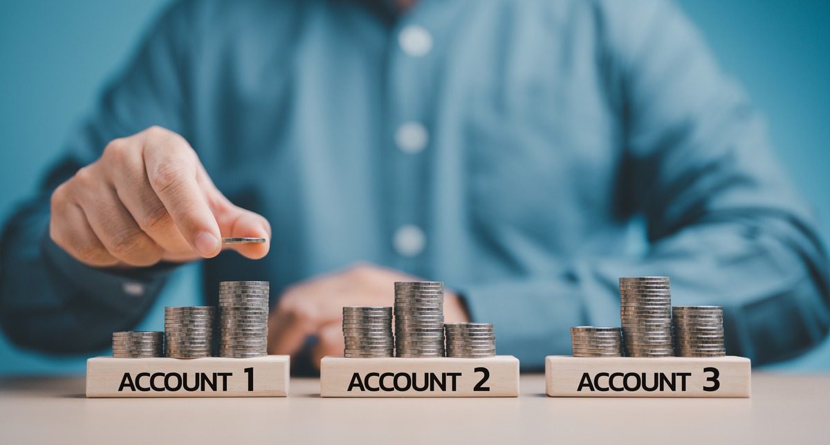 Conceptual image showing coin stacking to represent risk distribution across multiple accounts