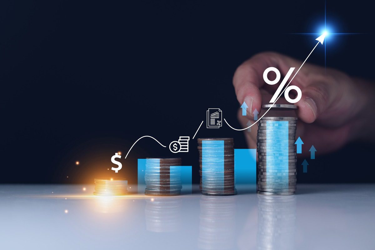 Illustration of coins stacked in an upward trend representing investment returns.